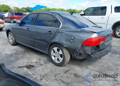 2009 Kia Optima Lx z USA, uszkodzony, nr VIN KNAGE228295310954